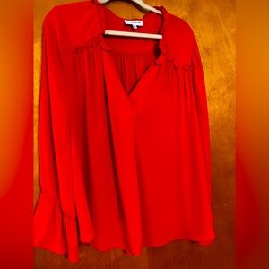 Ruffle detail blouse.